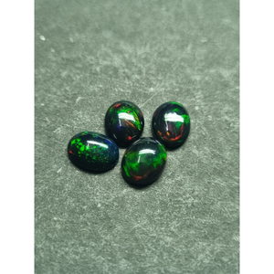 Opale noire d'Éthiopie naturelle, cabochon 10x12 mm, pierre précieuse en vrac |   Pierre d'opale noire ovale pour la fabrication de bijoux |   Fournisseur en gros - Product Image 5