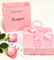 Boîte cadeau personnalisée en carton recyclable avec cadre photo et revêtement UV rose pour Noël et mariage