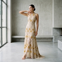 Robe midi en maille unie sans manches ajourée de haute qualité pour femme, nouvelle collection été 2026