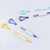 Vente en gros grattoir à langue en silicone en plastique avec brosse