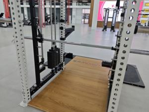 Kommerzielle Multifunktionale Stahl-Smith-Maschine, Full Cage Squat Rack, Hinterer Seilzug, Half Squat Stand für Fitnessstudio zum Fokussierten Armtraining - Product Image 6