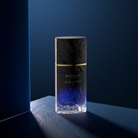 Flacon de parfum en verre de 50ml en vaporisateur de brume de luxe coloré unique et nouveau design personnalisé pour femme homme