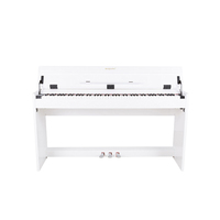 A Uniquely Designed White Plastic Digital Keyboard Piano with USB/MIDI Capability for Layering Tones Creative Work Piano Studio