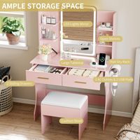Bureau de maquillage rose intelligent avec éclairage LED RVB et station de charge intégrée, table à maquillage à 2 tiroirs avec support pour sèche-cheveux.
