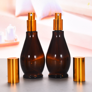 Bouteilles de parfum ambré de luxe en gros de 5ml à 100ml d'huiles de finition mate de forme ronde crème pour le visage logo personnalisé bouchon à vis boîte d'emballage - Product Image 5
