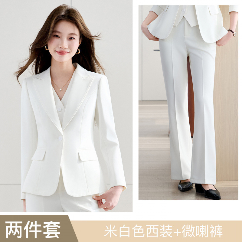 Off-white suit with slightly flared trousers
