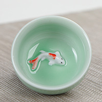 Vente en gros Service à thé Kung Fu carpe céladon Pot en porcelaine de six tasses Boîte cadeau compagnon d'activité au design chinois pour service à café
