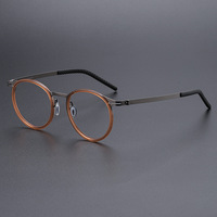 Lunettes de vue universelles à monture ronde en alliage de titane avec verres optiques en plastique pour hommes et femmes