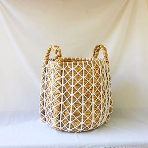 Kelana Rattan Basket blends bohemian charm with natural water hyacinth and intricate macrame, perfect <b>for</b> stylish home decor - Product Image 1