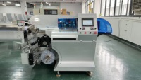 Machine d'emballage automatique à flux continu pour aliments, snacks, biscuits, barres chocolatées, emballage de petits sachets en film