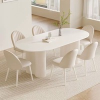 Ensemble de table à manger en pierre frittée de style moderne, luxe léger, stable, blanc pur, ovale, 6 places, avec chaises à pieds métalliques