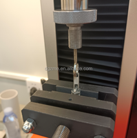 Dispositivo de prueba universal ASTM D 2061 Carga máxima 2kn Probador de resistencia a la tracción de cremallera