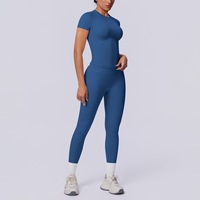 Ensemble de yoga sans couture en maille à manches courtes, couleur unie, taille trois segments, avec pantalon de fitness taille haute effet galbant couleur pêche