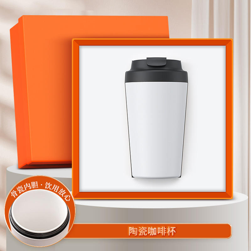 Taza de café de cerámica blanca de una sola taza