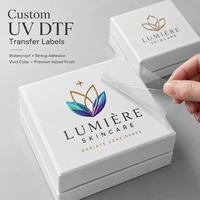 Autocollants de transfert UV DTF de luxe personnalisés, étiquettes de logo 3D imperméables, décalcomanies UV transparentes comme du cristal pour l'emballage de bouteilles, boîtes, OEM, ODM