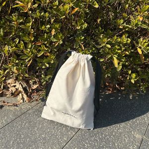 Low Price and Low Moq 100% Organic Cotton <b>Drawstring</b> Bag Eco-Friendly Dust-proof <b>Pouch</b> With Black Ribbon - Product Image 3