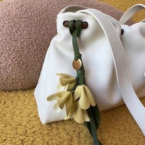 Pu <b>Leather</b> Woven Lightweight Imitation Golden Osmanthus Flower <b>Keychain</b> Charm Customizable Logo Direct Manufacturer - Product Image 4