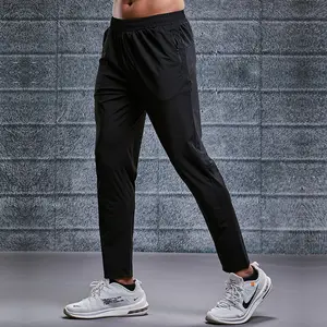 Gli uomini di sport In Esecuzione Pantaloni In Nylon Per Il Fitness Jogging Tasche Con Cerniera Nero di Formazione Pantaloni Da Ginnastica Calcio Ciclismo Pantaloni