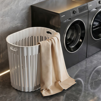 Panier de rangement en plastique ajouré respirant avec poignée de transport confortable, idéal pour le linge sale, la salle de bain et la chambre à coucher
