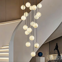 Décoration d'escalier de luxe de Style nordique suspendu suspension en marbre naturel lumière hôtel escalier escalier couloir éclairage en albâtre
