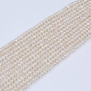 Vente en gros de matériaux et accessoires de bijouterie DIY de Zhuji, perles d'eau douce naturelles blanches et violettes de 4 à 5 mm, en vrac, pour la création de bijoux - Product Image 2