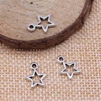 Colgante de Estrella Hueca de 10x13mm en Aleación de Zinc Tono Plata para Etiquetas de Recuerdo de Baby Shower