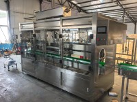 Machine de remplissage d'huile de cuisson (palme, tournesol, olive comestible) à suivi automatique et personnalisation en usine pour l'industrie alimentaire