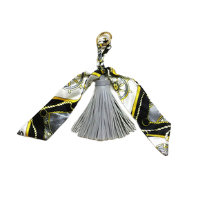 Porte-clés en cuir de luxe pour femme DZ, nouveau style, avec pompon, porte-clés de voiture et pendentif de sac, accessoire - Product Image 1