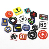 Étiquettes en silicone souple PVC 3D personnalisées avec logo de marque, gaufrées, écologiques, avec forme, couleur et taille personnalisées pour vêtements