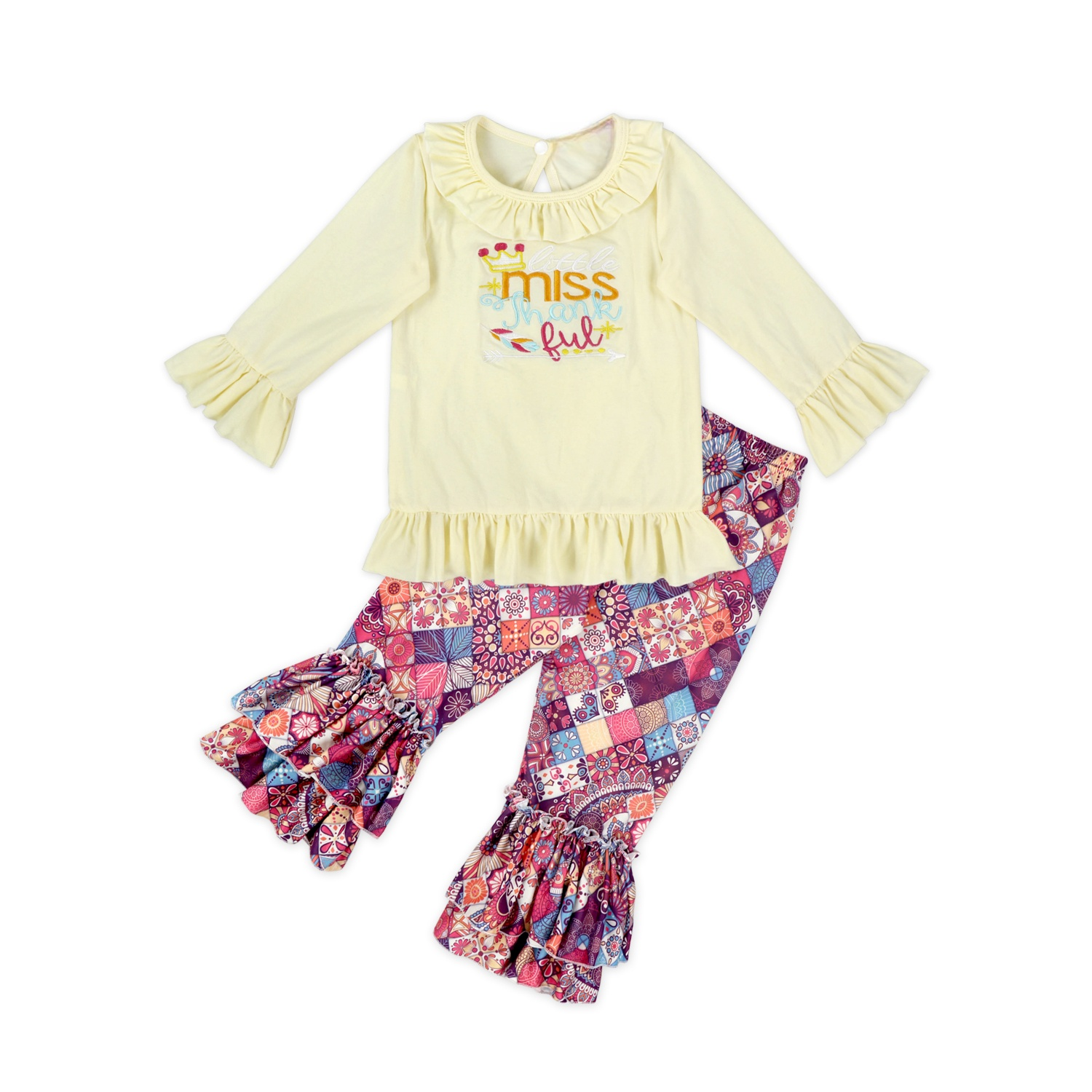 Top giallo chiaro e pantaloni con stampa patchwork multicolore