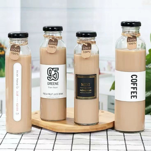 Botella de Vidrio para Bebidas de 350 ml (12 oz) con Tapa de Plástico, Portátil y Apilable, para Té con Leche, Jugo de Frutas y Café - Product Image 1