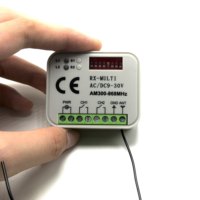 Système de télécommande pour porte de garage, système de télécommande 12V/24V AC/DC