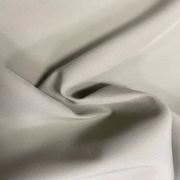 Lot de stock prêt à l'emploi, tissu pour pantalon uniforme, 93% polyester, 7% élasthanne, 155 GSM, extensible dans les 4 sens, tissé