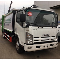 Camion à ordures compacteur à chargement arrière ISUZU ELF 12CBM 4x2 Diesel
