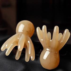 Outil Gua Sha en résine en forme de pieuvre pour la relaxation des méridiens du visage et du corps, le soulagement du stress, la beauté, la santé et la réduction des douleurs musculaires (vente en gros) - Product Image 1