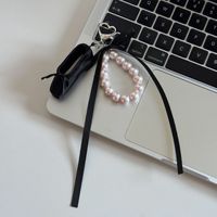 En gros, Charm de sac mignon en forme de chaussure de ballet avec perle, pompon et nœud en ruban, pour sac à dos, sac à main, cadeau sur le thème de la danse
