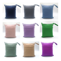 Sac à couches à double fermeture éclair avec film imperméable 30*36 cm, petite trousse de toilette en gros, sac de rangement pour couches de couleur unie