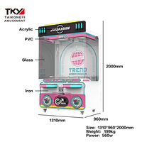 Machine à grue à double poste avec espace de rangement extra large, conception adaptée aux enfants, hauteur personnalisable pour la distribution interactive de jouets en boîte surprise