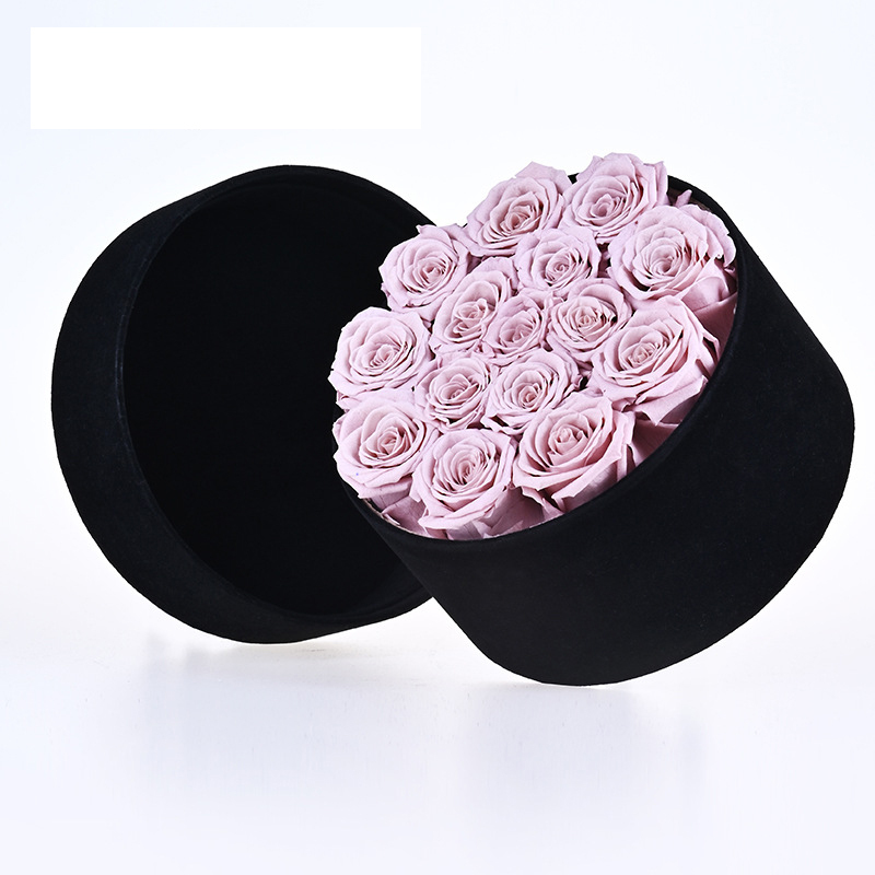 15 rose in scatola di velluto