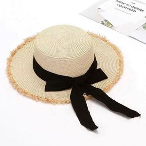 Wholesale Female Bow Large Brim Sun Beach <b>Hat</b> <b>Flat</b> Top Women's Summer <b>Hat</b> Raffia Straw <b>Hats</b> - Product Image 3