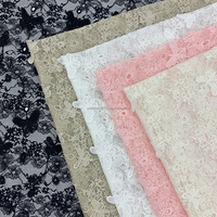 Tissu en dentelle à sequins brodés 3D 100 % polyester de haute qualité, approuvé directement par l'usine, pour robes de mariée - Collection 2025