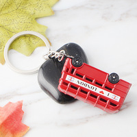 Porte-clés souvenir d'Angleterre, bus rouge de Londres, cabine téléphonique rouge