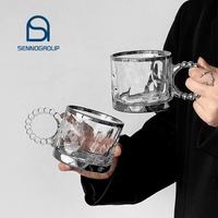 Offres Spéciales créatif résistant à la chaleur eau bière lait sans tige verre lumière luxe affaires Style noir tasse à café avec poignée en perle