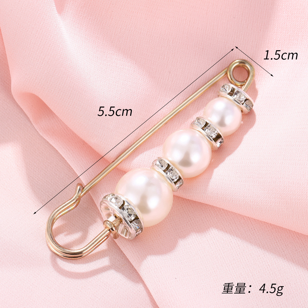 Trois perles en strass, blanches (5,5*1,5CM)