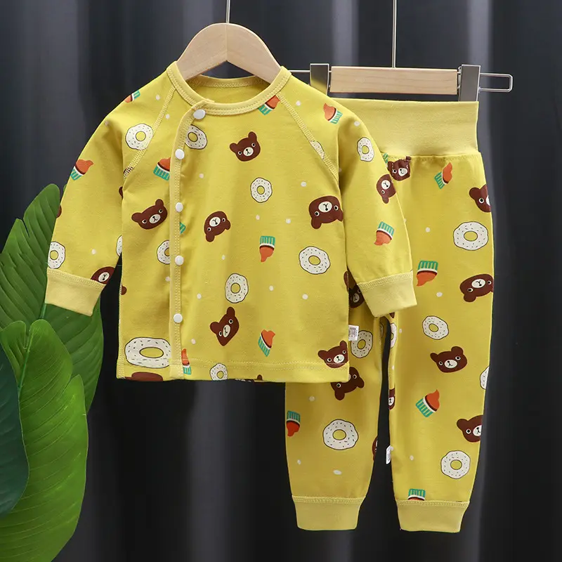 Venta al por mayor de dibujos animados de algodón suave niños Pijamas 2 Set niña niños de manga larga camiseta y pantalones conjunto