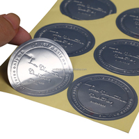 Feuille d'autocollant de logo en relief en métal feuille d'or et d'argent personnalisée bon marché Étiquette d'emballage de vin adhésive privée
