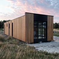 Service à guichet unique Nature Camping Conception en bois Villa préfabriquée personnalisée Pack plat Maison conteneur pour la vie de loisirs