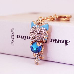Porte-clés populaire petit et mignon en forme de chat porte-bonheur avec pendentif chat en strass et diamants de cristal pour téléphone et sac - Product Image 6