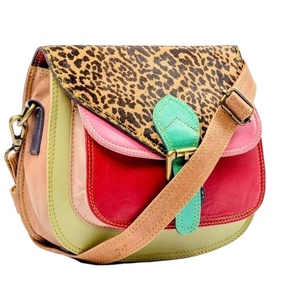 กระเป๋าหนังแฟชั่นตะวันตกทำด้วยมือคุณภาพสูงพร้อมฝาปิดมีซิปพิมพ์ลายวัวแท้และของตกแต่งพู่ - Product Image 1