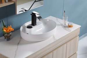 Fregadero de cerámica de lavabo de arte ovalado moderno encimera al por mayor PARA USO HOTELERO diseño novedoso en blanco para hoteles - Product Image 4